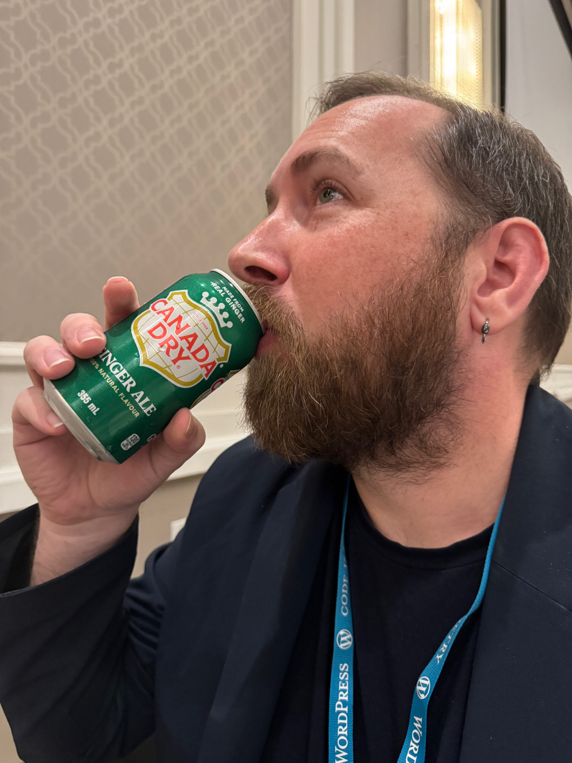 James Giroux, a Canadian man, sips on Canada Dry Ginger Ale